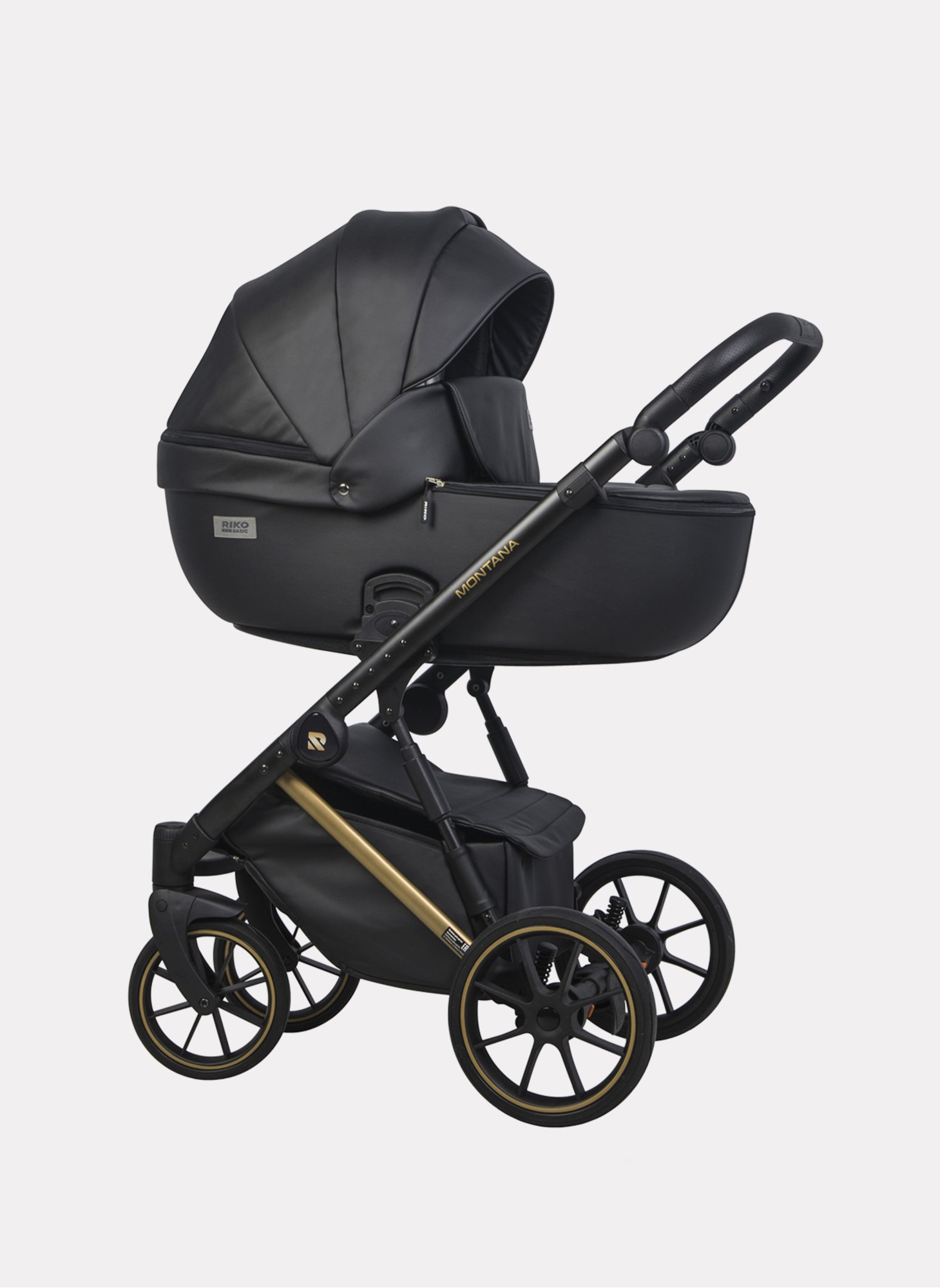Детская коляска 2 в 1 Riko Basic Montana Premium Gold 02 из экокожи | Реверсивный прогулочный блок | Регулируемая амортизация | Передние поворачиваемые колеса из резины | Цвет - черный