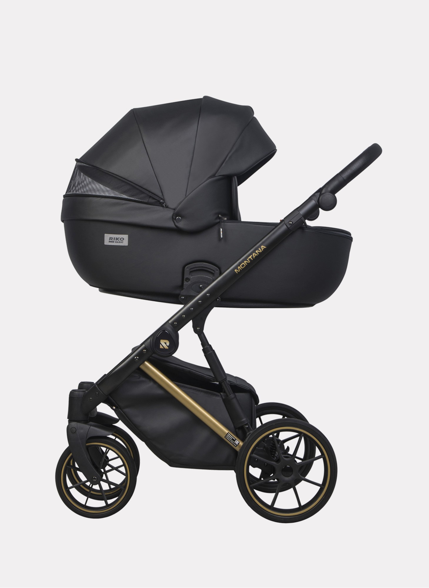 Детская коляска 2 в 1 Riko Basic Montana Premium Gold 02 из экокожи | Реверсивный прогулочный блок | Регулируемая амортизация | Передние поворачиваемые колеса из резины | Цвет - черный