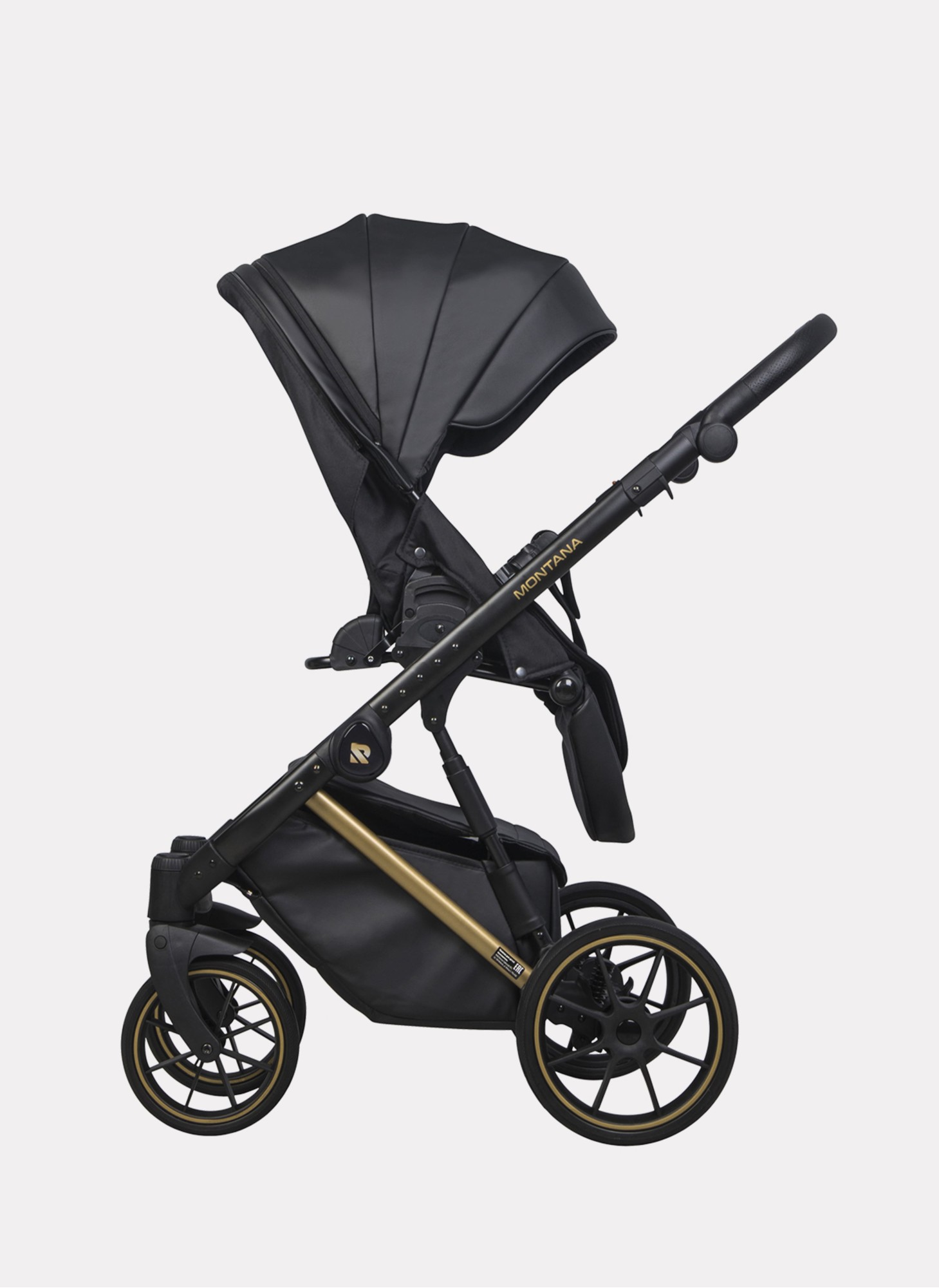 Детская коляска 2 в 1 Riko Basic Montana Premium Gold 02 из экокожи | Реверсивный прогулочный блок | Регулируемая амортизация | Передние поворачиваемые колеса из резины | Цвет - черный