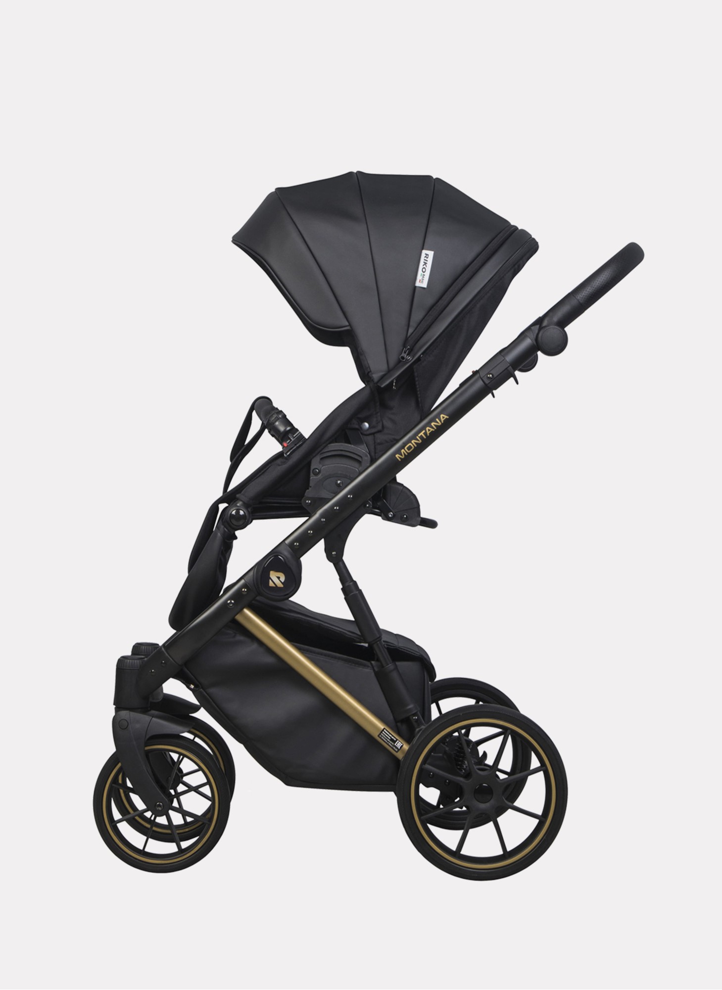Детская коляска 2 в 1 Riko Basic Montana Premium Gold 02 из экокожи | Реверсивный прогулочный блок | Регулируемая амортизация | Передние поворачиваемые колеса из резины | Цвет - черный