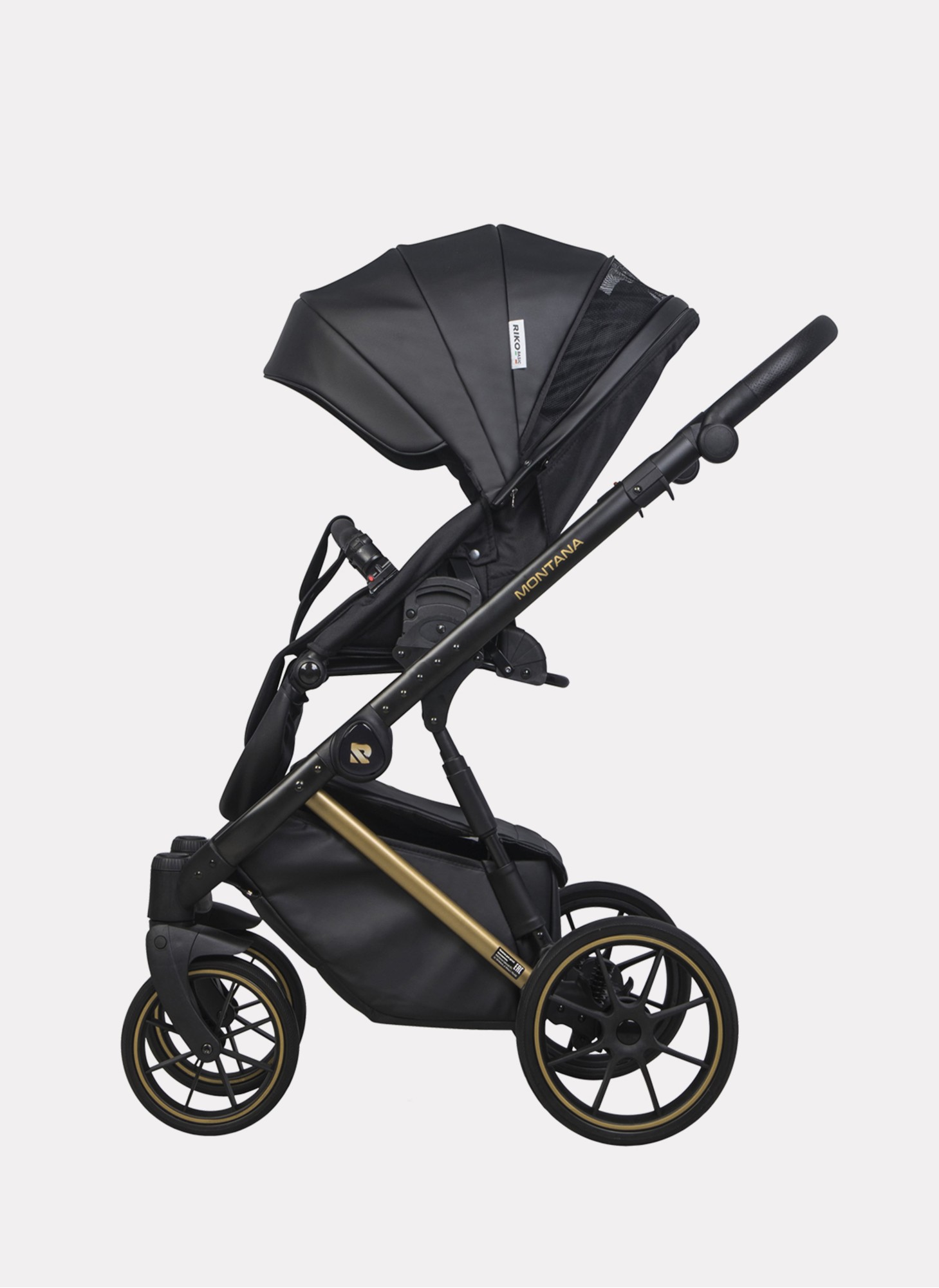 Детская коляска 2 в 1 Riko Basic Montana Premium Gold 02 из экокожи | Реверсивный прогулочный блок | Регулируемая амортизация | Передние поворачиваемые колеса из резины | Цвет - черный
