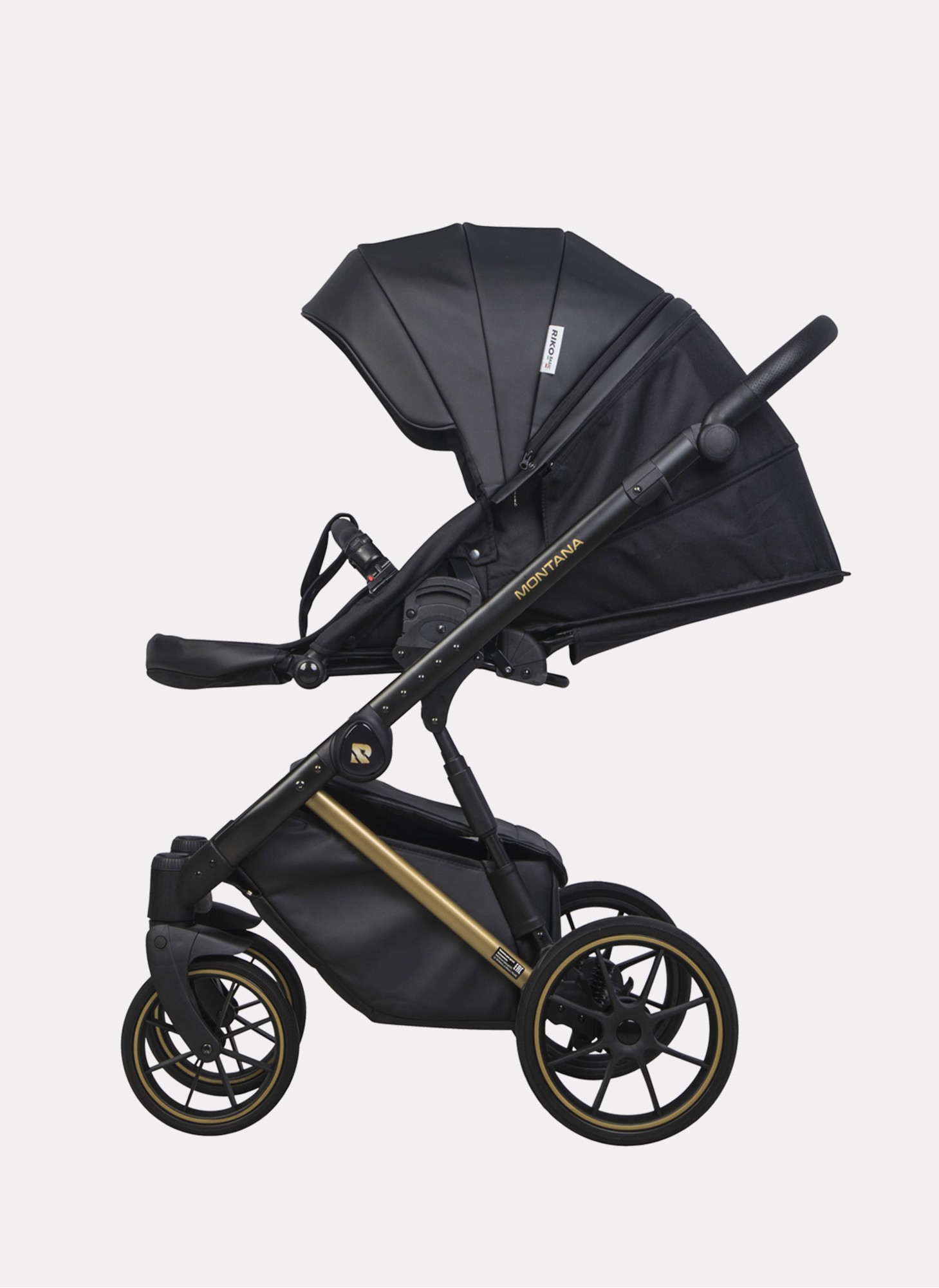 Детская коляска 2 в 1 Riko Basic Montana Premium Gold 02 из экокожи | Реверсивный прогулочный блок | Регулируемая амортизация | Передние поворачиваемые колеса из резины | Цвет - черный