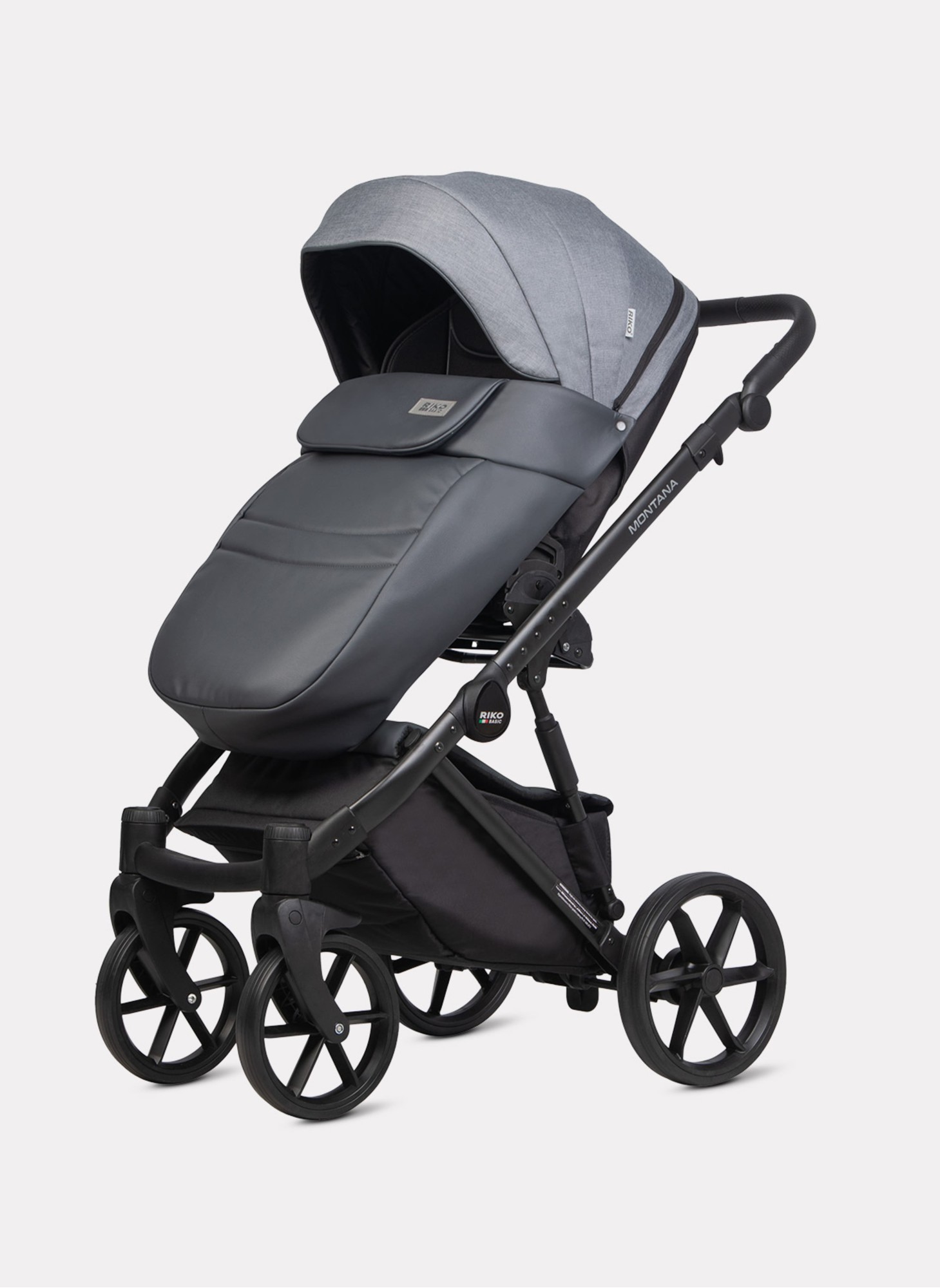 Детская коляска 2 в 1 Riko Basic Montana Plus | Реверсивный прогулочный блок | Регулируемая амортизация | Передние поворачиваемые колеса из вспененной резины | Цвет - графитовый