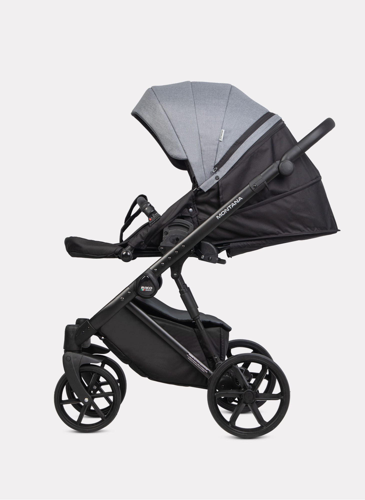 Детская коляска 2 в 1 Riko Basic Montana Plus | Реверсивный прогулочный блок | Регулируемая амортизация | Передние поворачиваемые колеса из вспененной резины | Цвет - графитовый