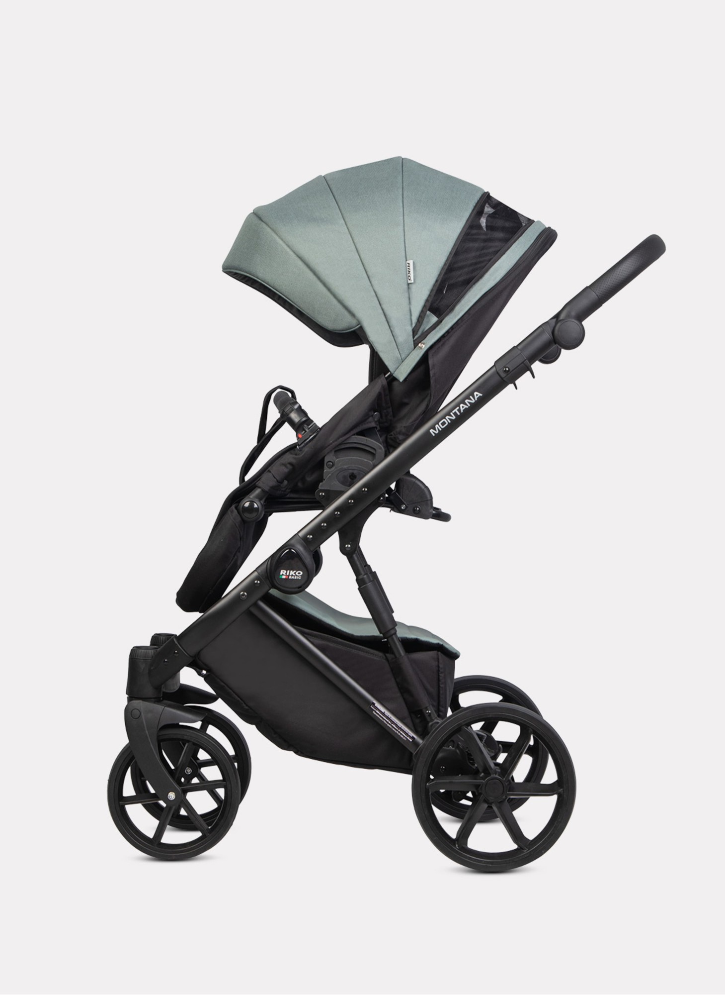 Детская коляска 2 в 1 Riko Basic Montana Plus | Реверсивный прогулочный блок | Регулируемая амортизация | Передние поворачиваемые колеса из вспененной резины | Цвет - зеленый