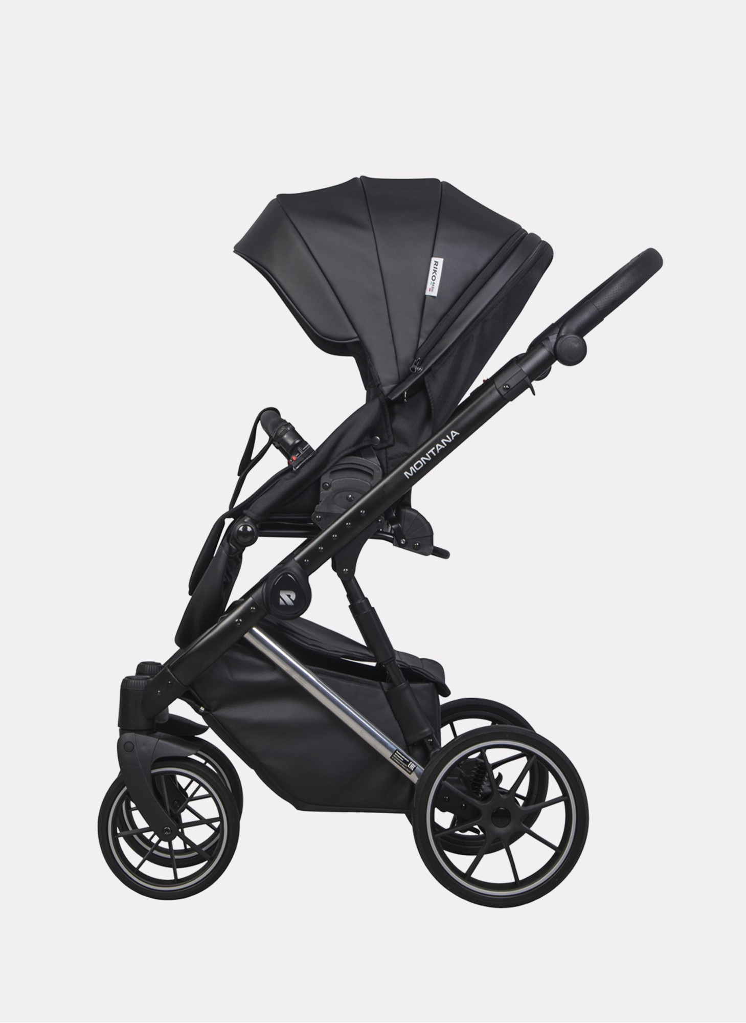 Детская коляска 2 в 1 Riko Basic Montana Premium Silver 22 из экокожи | Реверсивный прогулочный блок | Регулируемая амортизация | Передние поворачиваемые колеса из резины | Цвет - черный