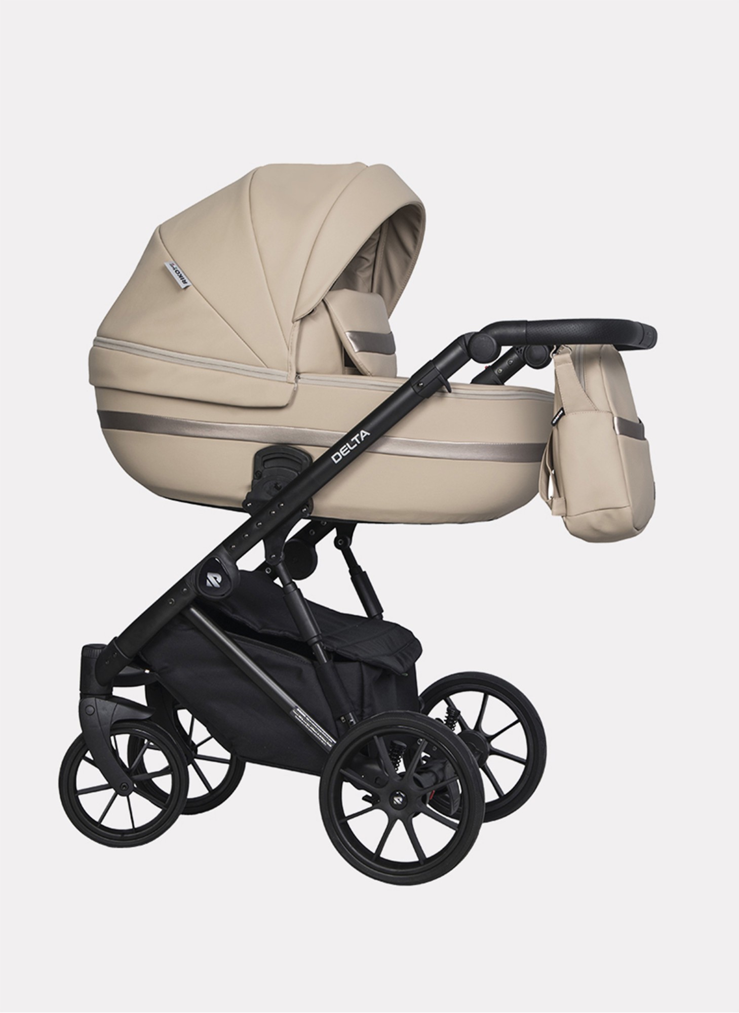 Детская коляска 2 в 1 Riko Basic Delta Ecco из экокожи, с поворотными передними колесами | Реверсивный прогулочный блок | Колеса из вспененной резины | Цвет - бежевый