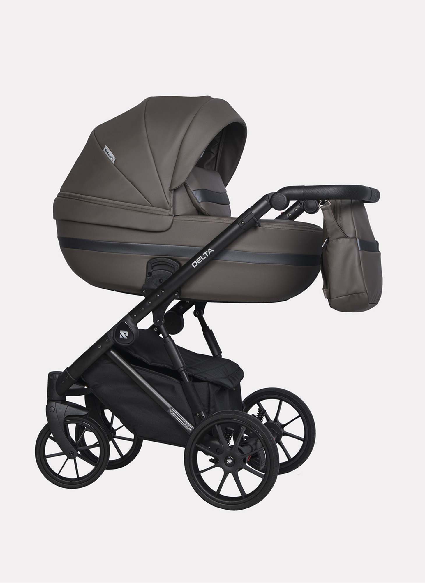 Детская коляска 2 в 1 Riko Basic Delta Ecco из экокожи, с поворотными передними колесами | Реверсивный прогулочный блок | Колеса из вспененной резины | Цвет - коричневый