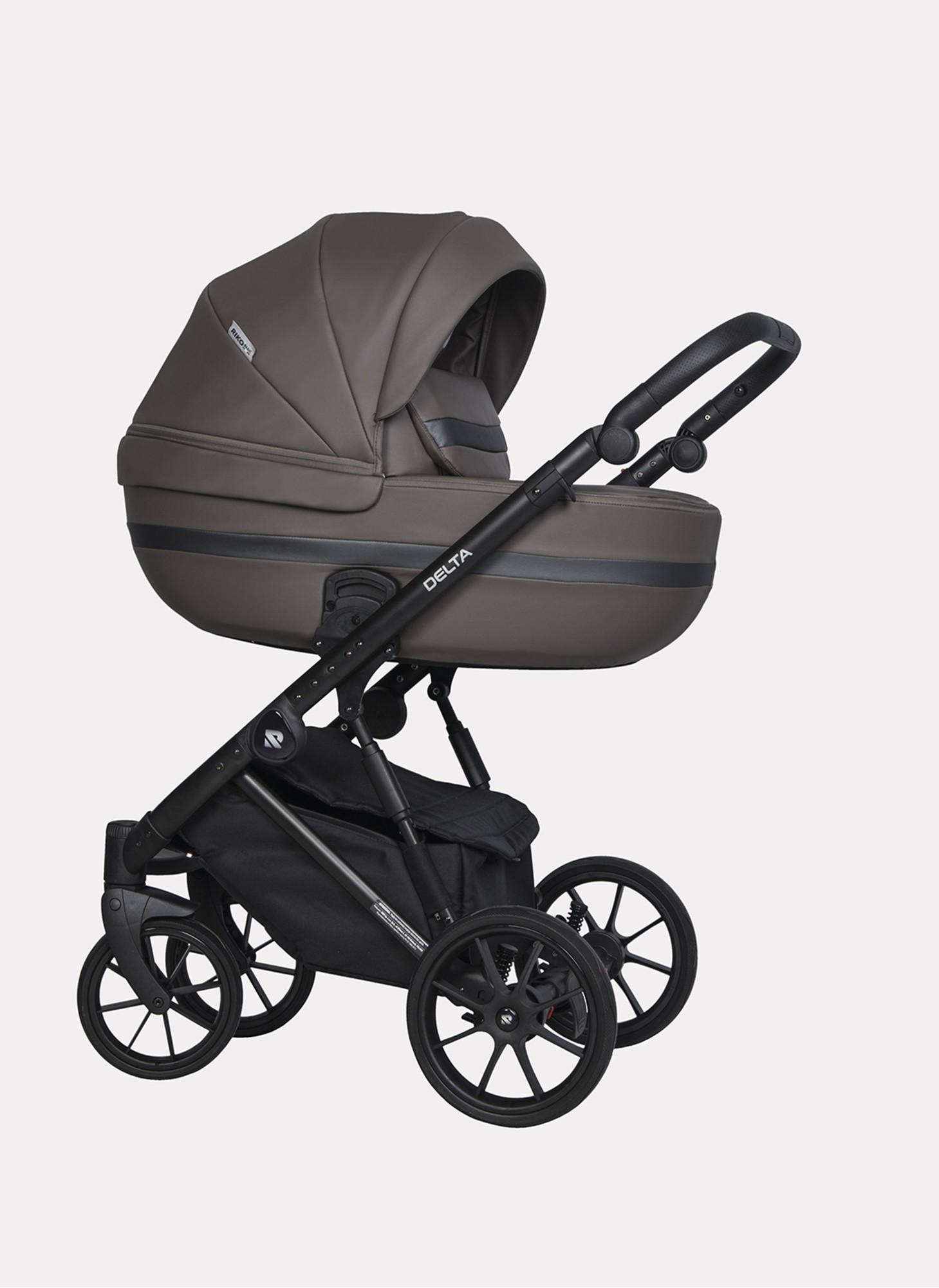 Детская коляска 2 в 1 Riko Basic Delta Ecco из экокожи, с поворотными передними колесами | Реверсивный прогулочный блок | Колеса из вспененной резины | Цвет - коричневый