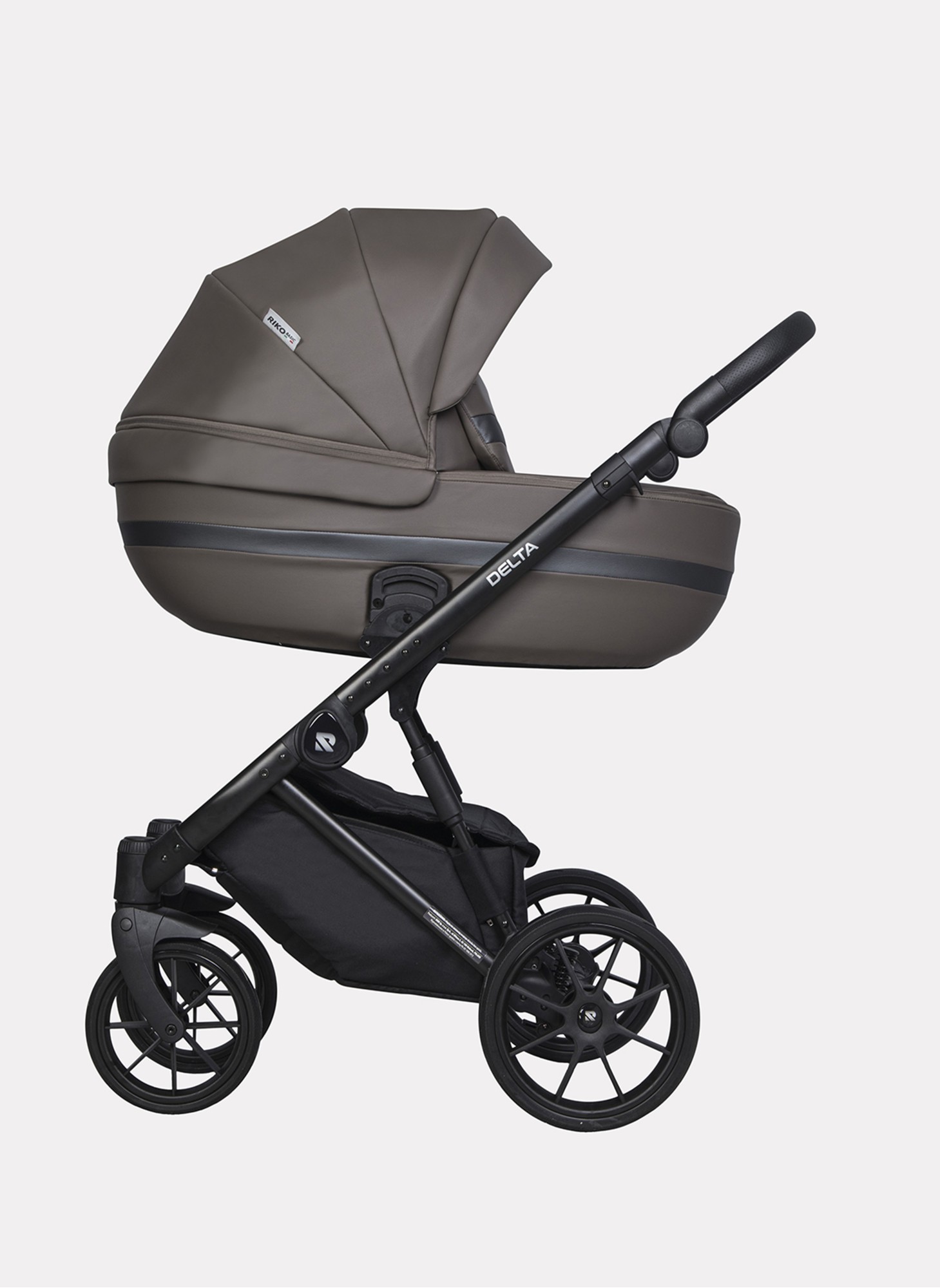 Детская коляска 2 в 1 Riko Basic Delta Ecco из экокожи, с поворотными передними колесами | Реверсивный прогулочный блок | Колеса из вспененной резины | Цвет - коричневый