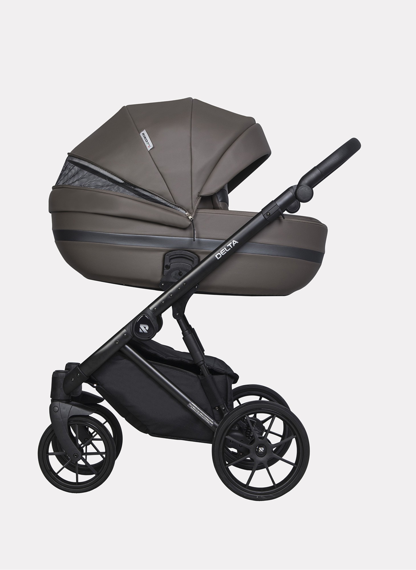 Детская коляска 2 в 1 Riko Basic Delta Ecco из экокожи, с поворотными передними колесами | Реверсивный прогулочный блок | Колеса из вспененной резины | Цвет - коричневый