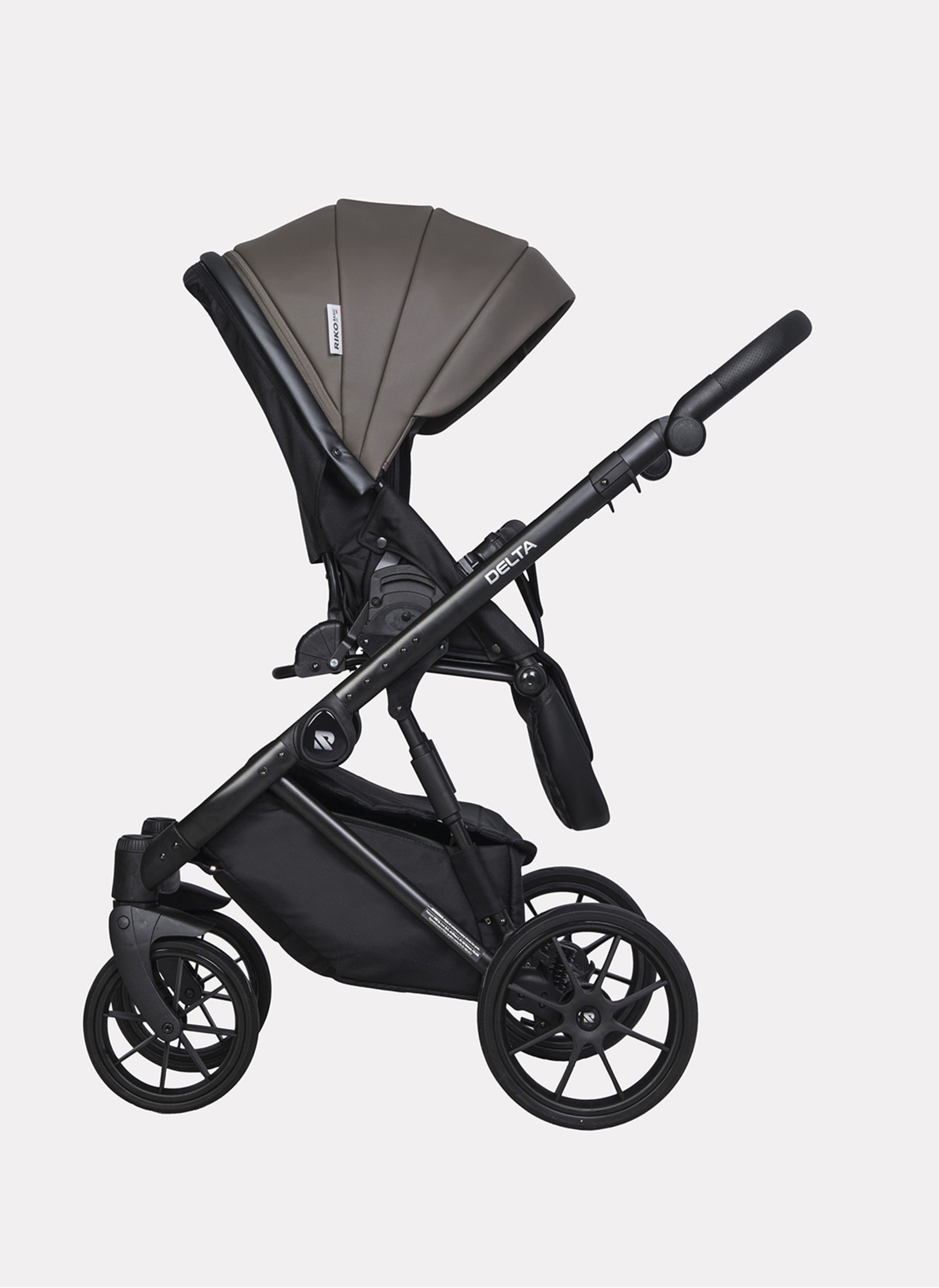 Детская коляска 2 в 1 Riko Basic Delta Ecco из экокожи, с поворотными передними колесами | Реверсивный прогулочный блок | Колеса из вспененной резины | Цвет - коричневый