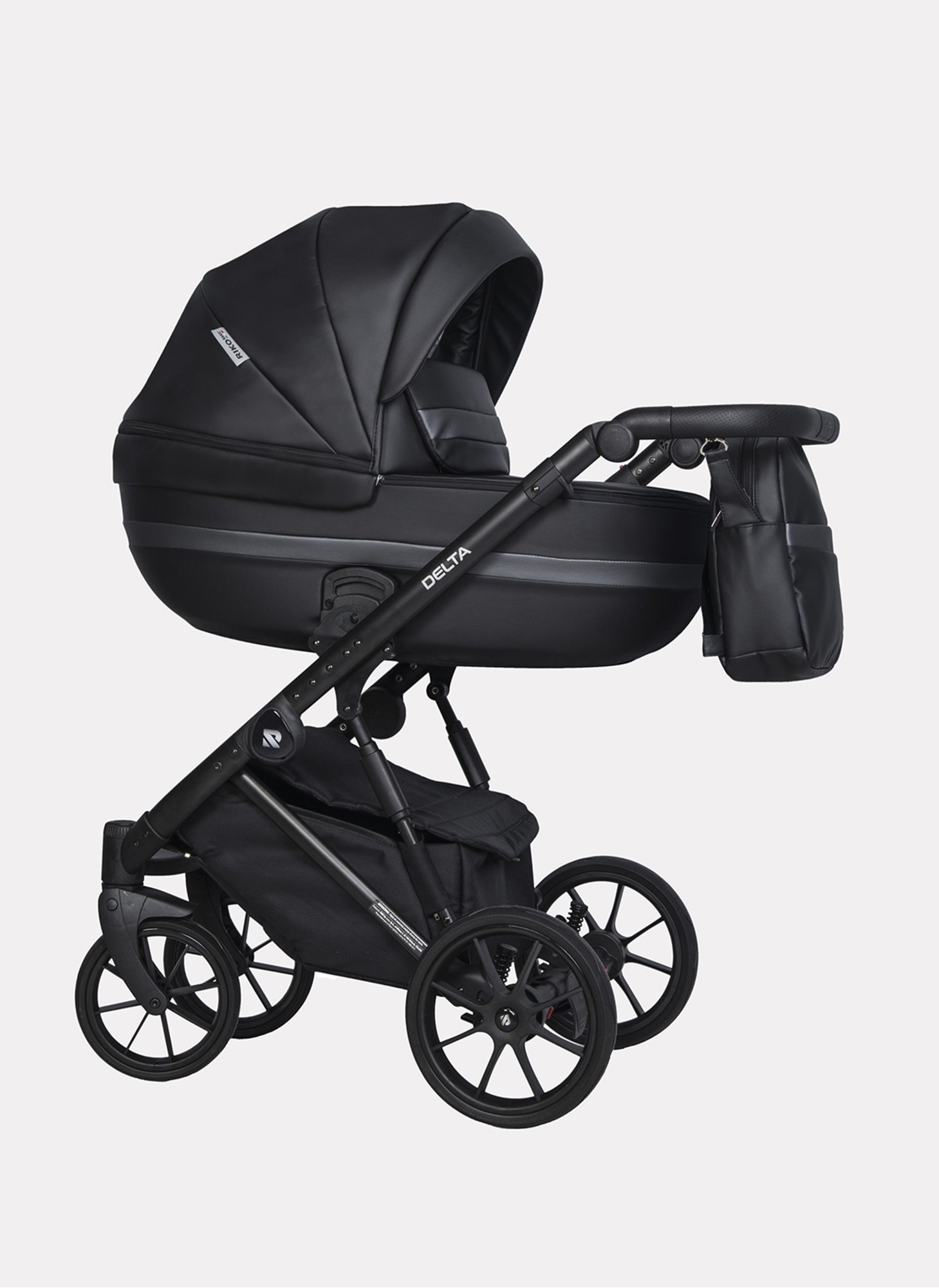 Детская коляска 2 в 1 Riko Basic Delta Ecco из экокожи, с поворотными передними колесами | Реверсивный прогулочный блок | Колеса из вспененной резины | Цвет - черный
