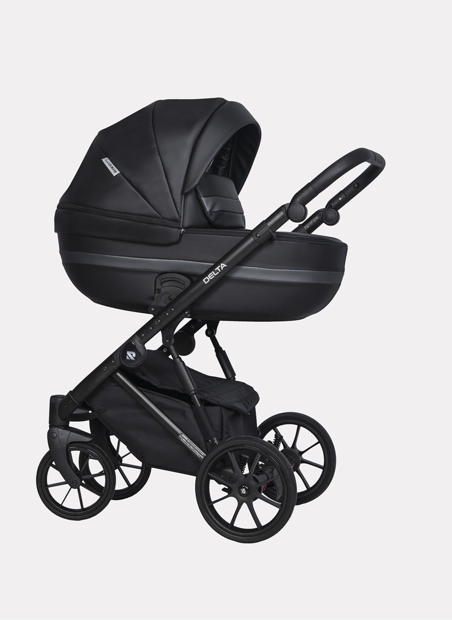 Детская коляска 2 в 1 Riko Basic Delta Ecco из экокожи, с поворотными передними колесами | Реверсивный прогулочный блок | Колеса из вспененной резины | Цвет - черный