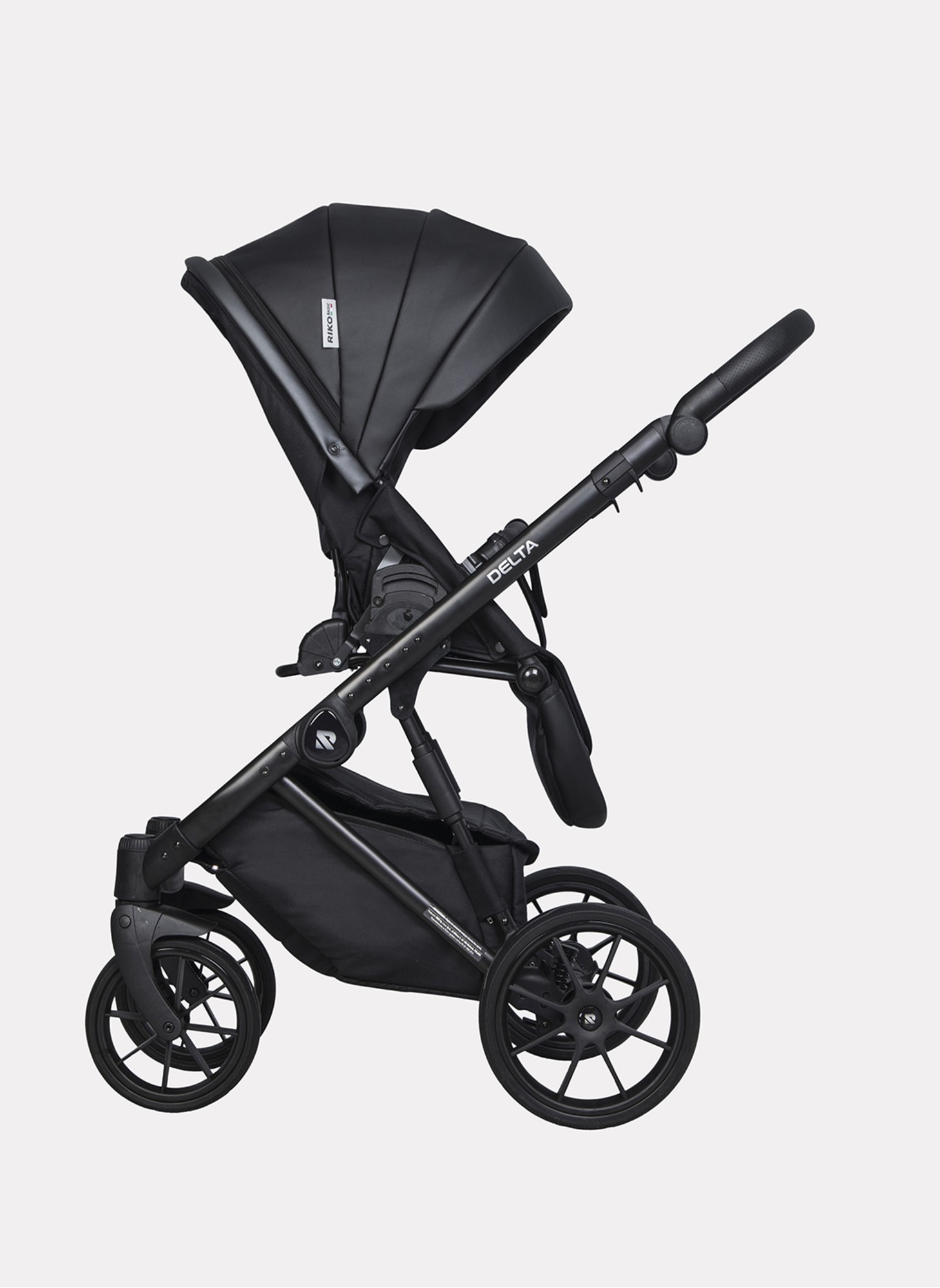 Детская коляска 2 в 1 Riko Basic Delta Ecco из экокожи, с поворотными передними колесами | Реверсивный прогулочный блок | Колеса из вспененной резины | Цвет - черный