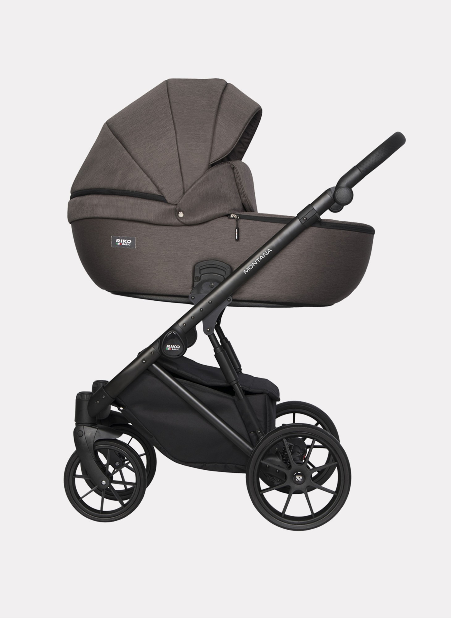 Детская коляска 2 в 1 Riko Basic Montana | Реверсивный прогулочный блок | Пружинная амортизация | Передние поворачиваемые колеса с фиксацией | Цвет - коричневый