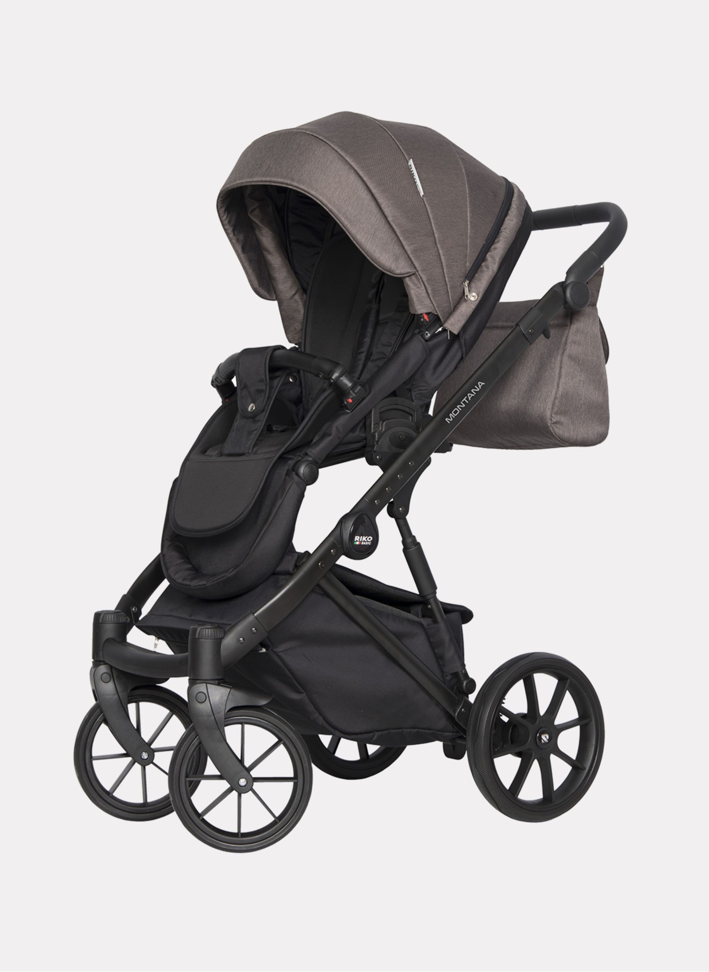 Детская коляска 2 в 1 Riko Basic Montana | Реверсивный прогулочный блок | Пружинная амортизация | Передние поворачиваемые колеса с фиксацией | Цвет - коричневый