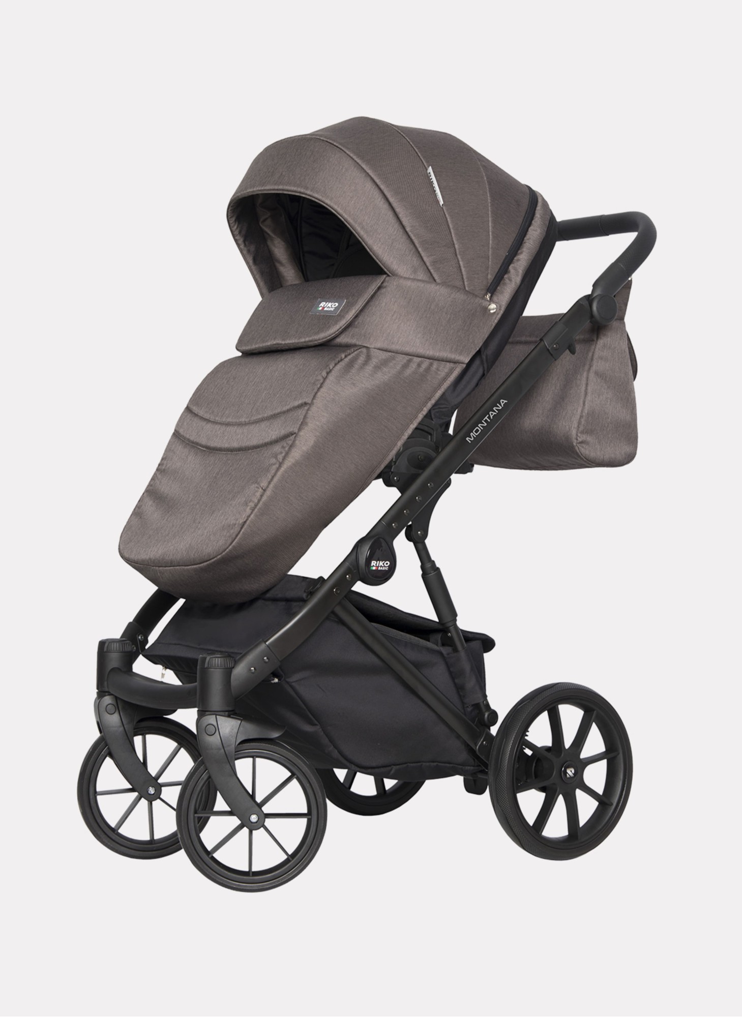 Детская коляска 2 в 1 Riko Basic Montana | Реверсивный прогулочный блок | Пружинная амортизация | Передние поворачиваемые колеса с фиксацией | Цвет - коричневый