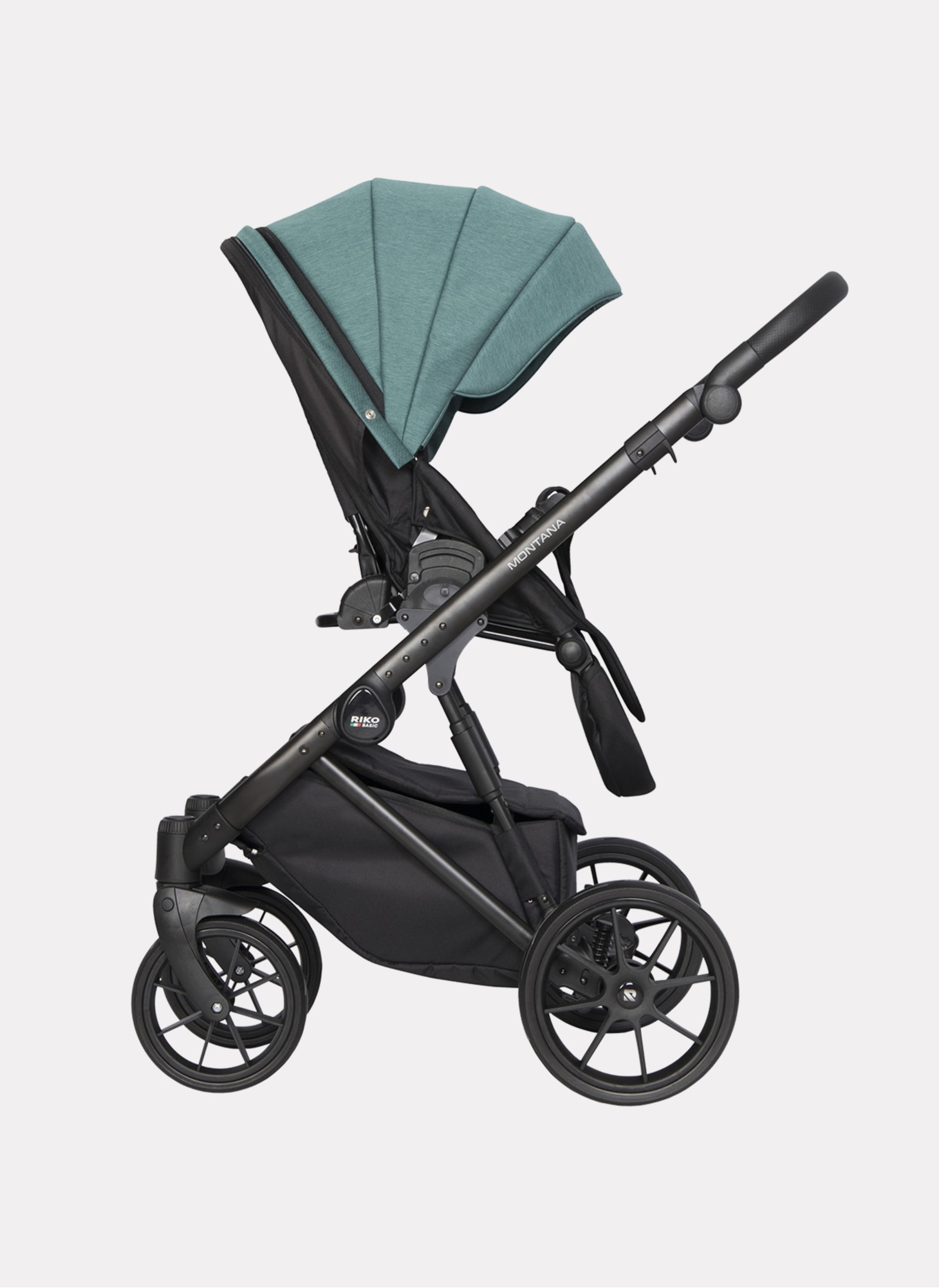 Детская коляска 2 в 1 Riko Basic Montana | Реверсивный прогулочный блок | Пружинная амортизация | Передние поворачиваемые колеса с фиксацией | Цвет - зеленый
