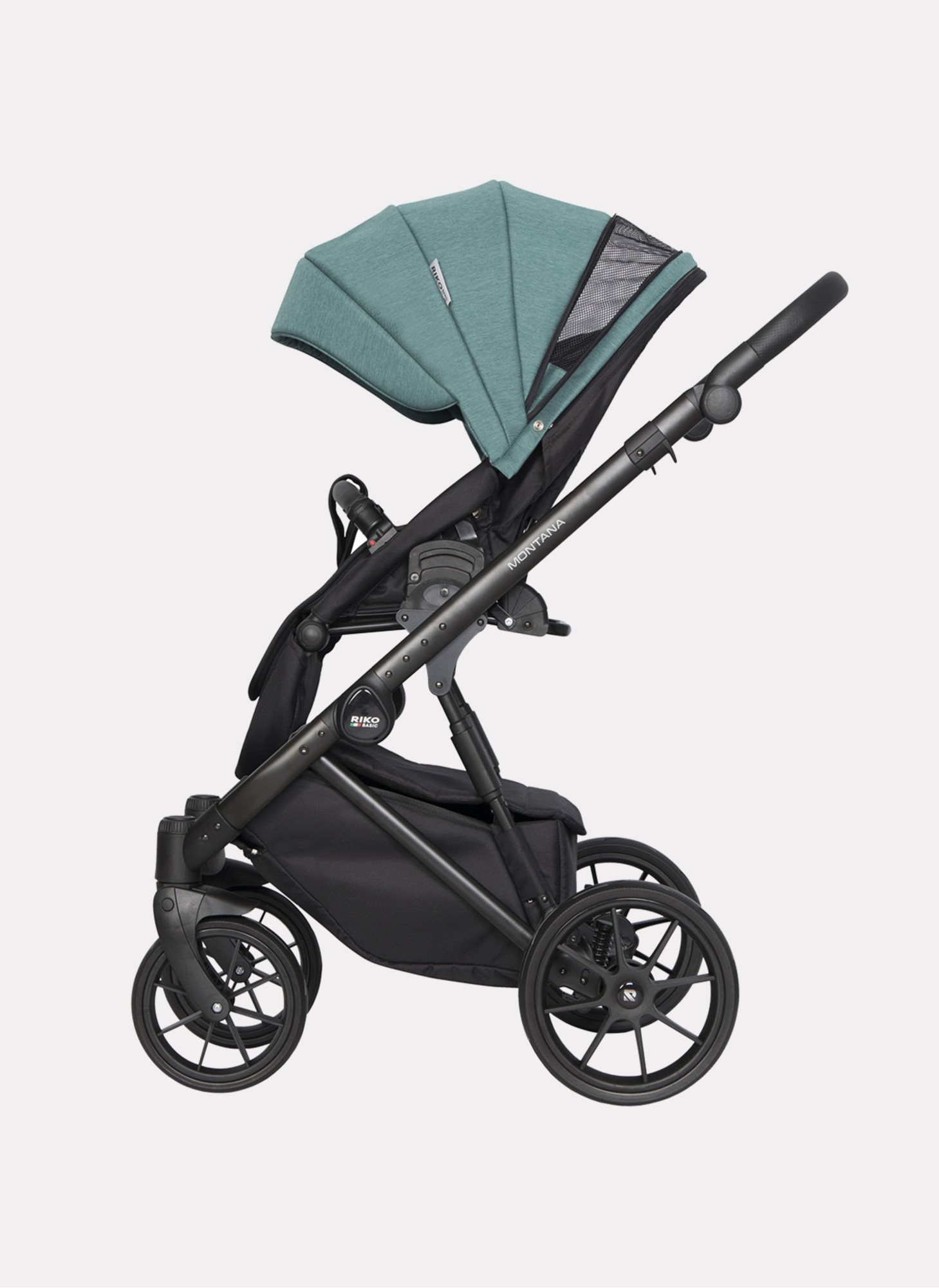 Детская коляска 2 в 1 Riko Basic Montana | Реверсивный прогулочный блок | Пружинная амортизация | Передние поворачиваемые колеса с фиксацией | Цвет - зеленый