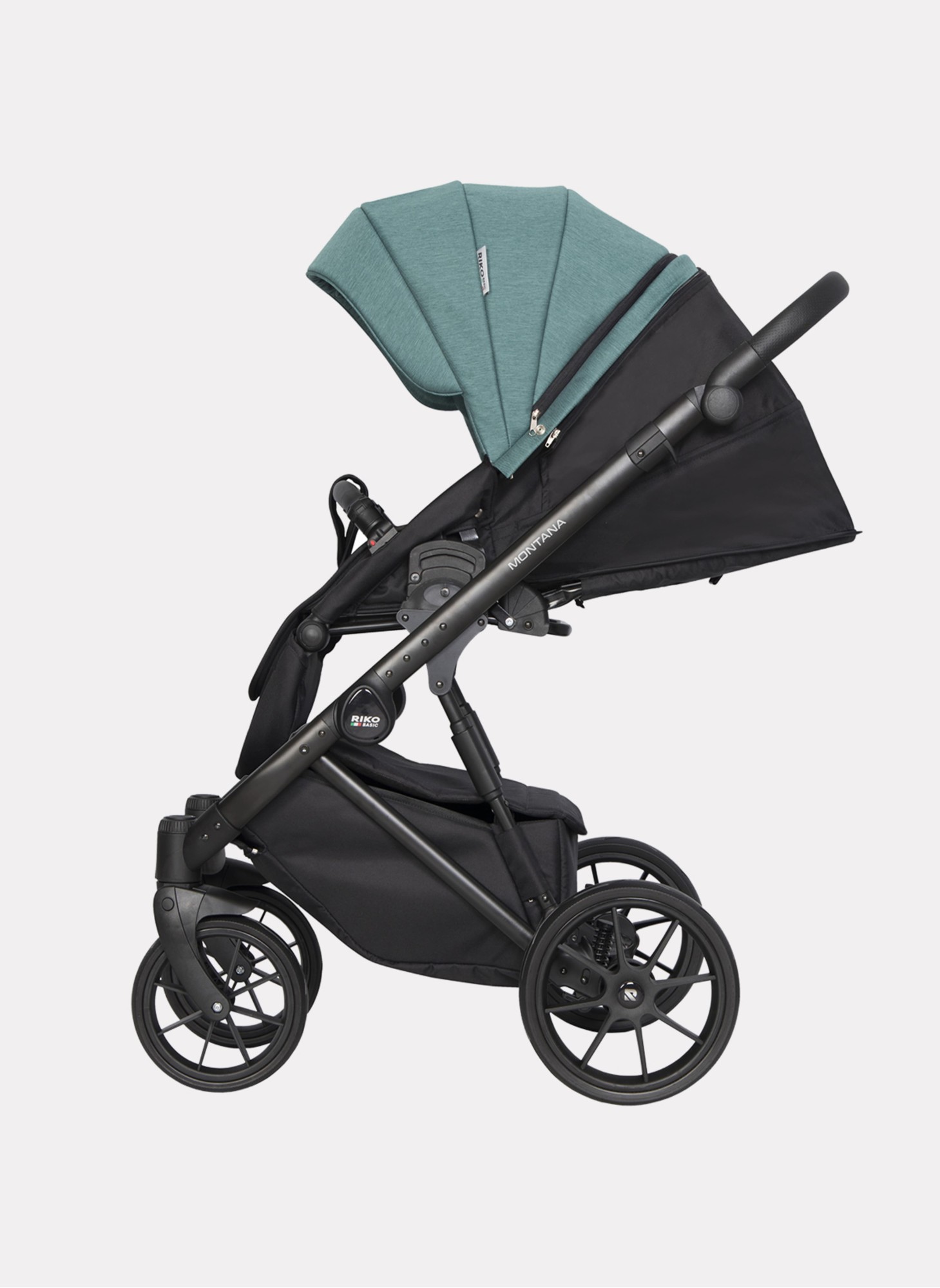 Детская коляска 2 в 1 Riko Basic Montana | Реверсивный прогулочный блок | Пружинная амортизация | Передние поворачиваемые колеса с фиксацией | Цвет - зеленый