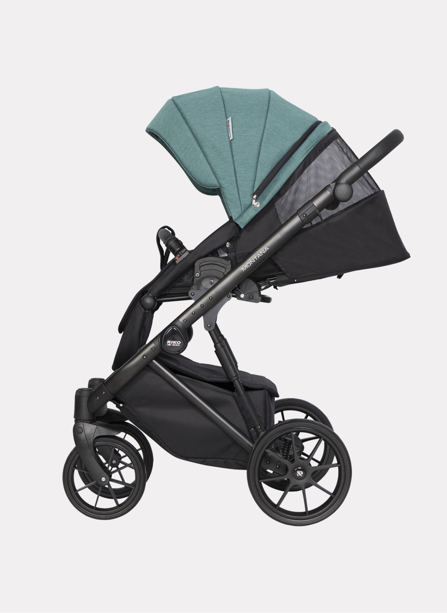 Детская коляска 2 в 1 Riko Basic Montana | Реверсивный прогулочный блок | Пружинная амортизация | Передние поворачиваемые колеса с фиксацией | Цвет - зеленый
