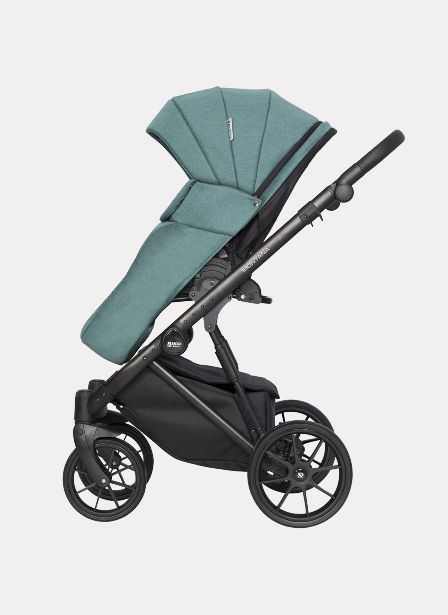 Детская коляска 2 в 1 Riko Basic Montana | Реверсивный прогулочный блок | Пружинная амортизация | Передние поворачиваемые колеса с фиксацией | Цвет - зеленый