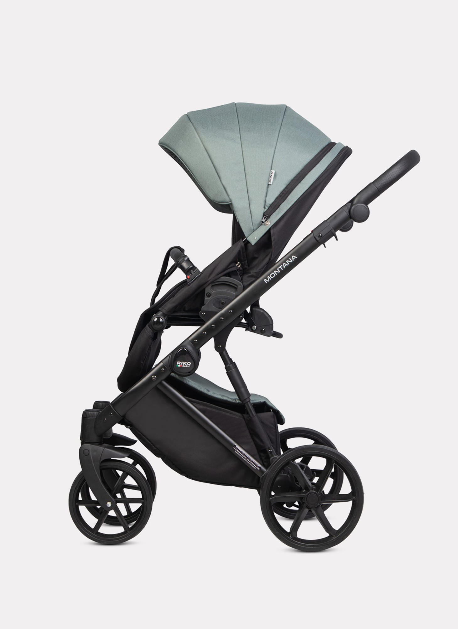 Детская коляска 2 в 1 Riko Basic Montana 2025 | Реверсивный прогулочный блок | Пружинная амортизация | Передние поворачиваемые колеса с фиксацией | Цвет - зеленый